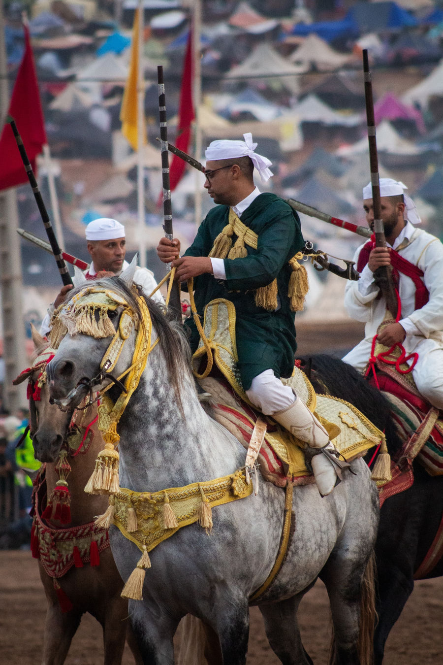 Tbourida horsemen at a moussem in Morocco