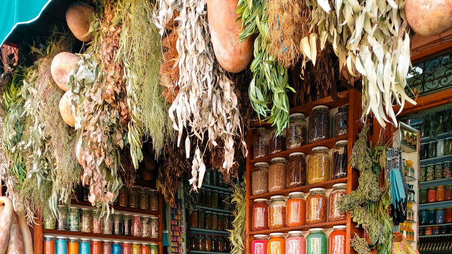 Colourful spices and dried flowers in a Marrakech souk, the city where painter Salah Benjkan lives and works